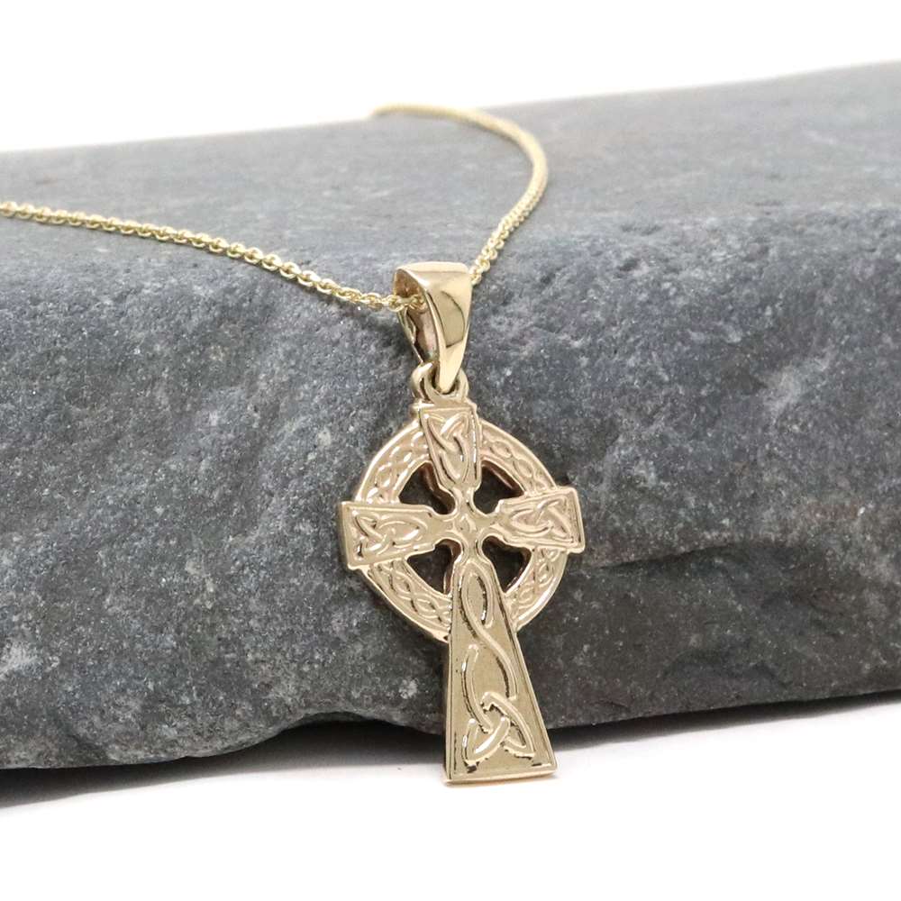 Replica Cross Pendant Of The Celtic Cross Of Moone In Silver And Gold.